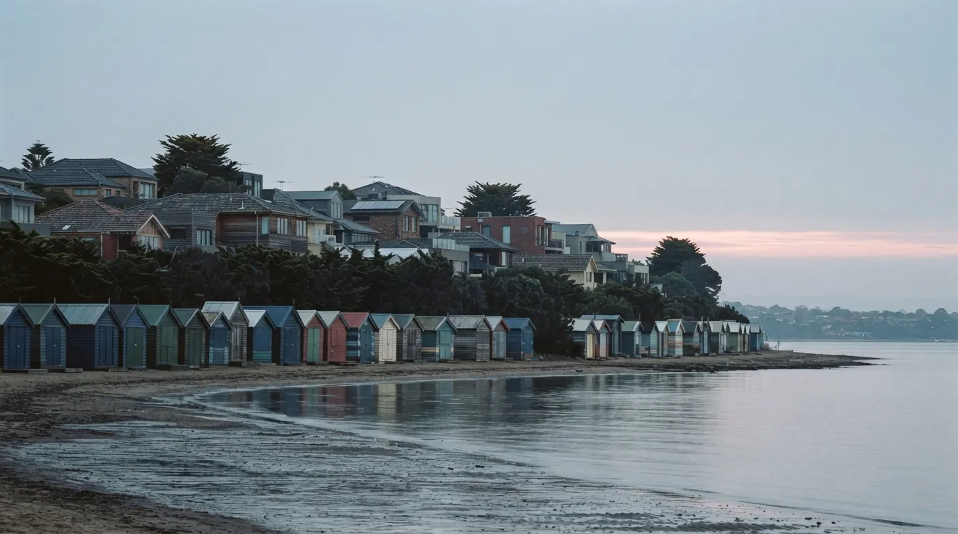 An elevated view along the Melbourne bayside foreshore where two adjoining suburbs of different housing scale meet